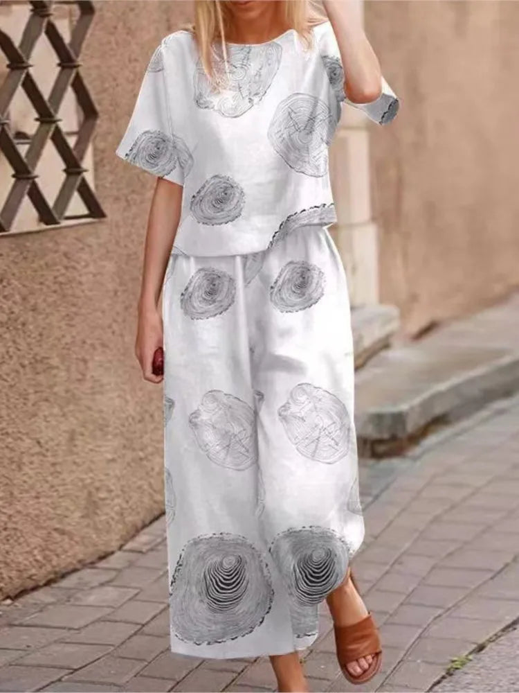 Autumn New Women's Fashion Printed Cotton Linen Plant Flower Three Sleeve Short Sleeved Casual Nine Piece Pants Two-piece Set