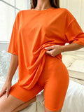 Large-size women's casual summer short-sleeved dress with tight shorts set, suitable for exercise and fitness, soft and comforta